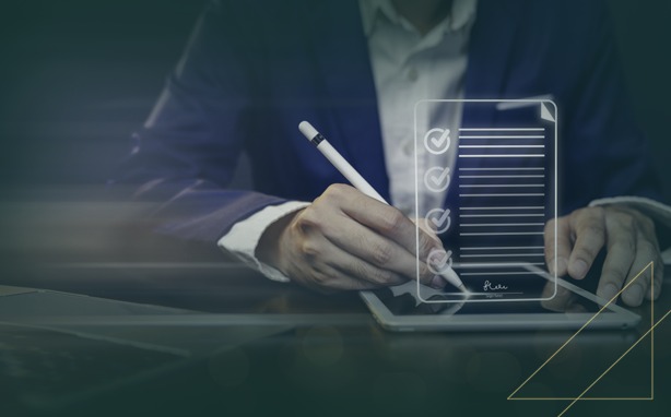 Person signing a holographic document on a tablet with a stylus.
